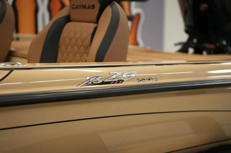 Slide: The Image of 2025 Caymas XS 20 PRO boat interior with sleek design and luxurious seating. - 16