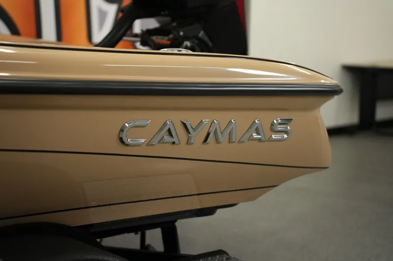 Slide: The Image of 2025 Caymas XS 20 PRO boat interior with tan seating and custom flooring design. - 17
