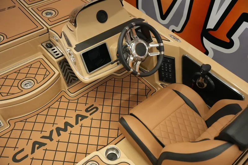 Slide: The Image of Interior storage compartments of 2025 Caymas XS 20 PRO boat, featuring organized layout and hydraulic lifts. - 26