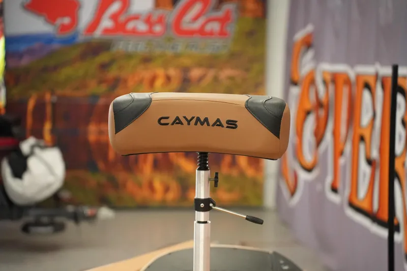 Slide: The Image of 2025 Caymas XS 20 PRO boat seat with luxurious tan and black design. - 6