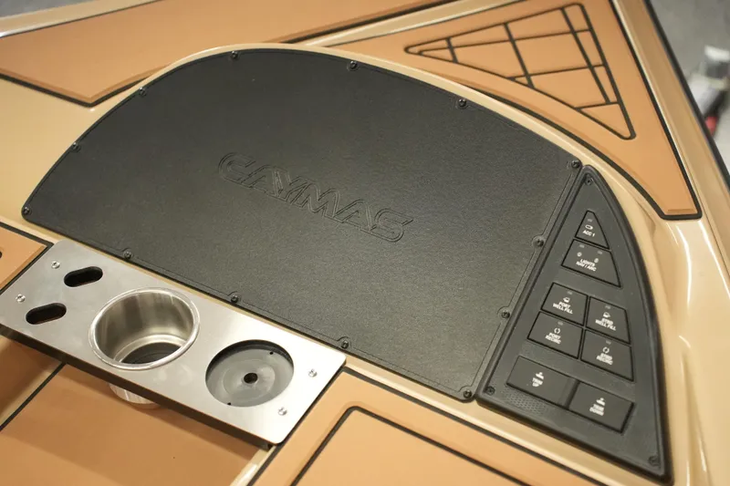 Slide: The Image of 2025 Caymas XS 20 PRO boat storage compartments open, showcasing organized interior layout. - 9