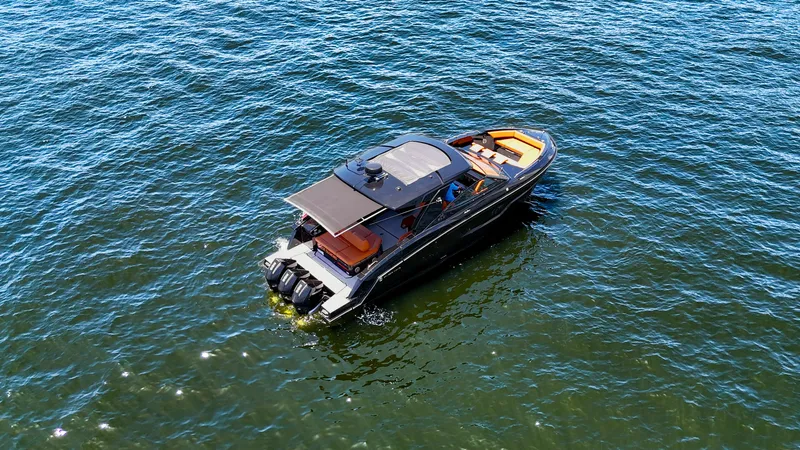 Slide: The Image of 2022 Cruisers Yachts 38 GLS on open water, aerial view. - 7