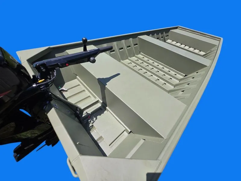 Slide: The Image of 2025 Weldcraft 1652-RL boat on trailer, parked outdoors under sunny sky. - 5