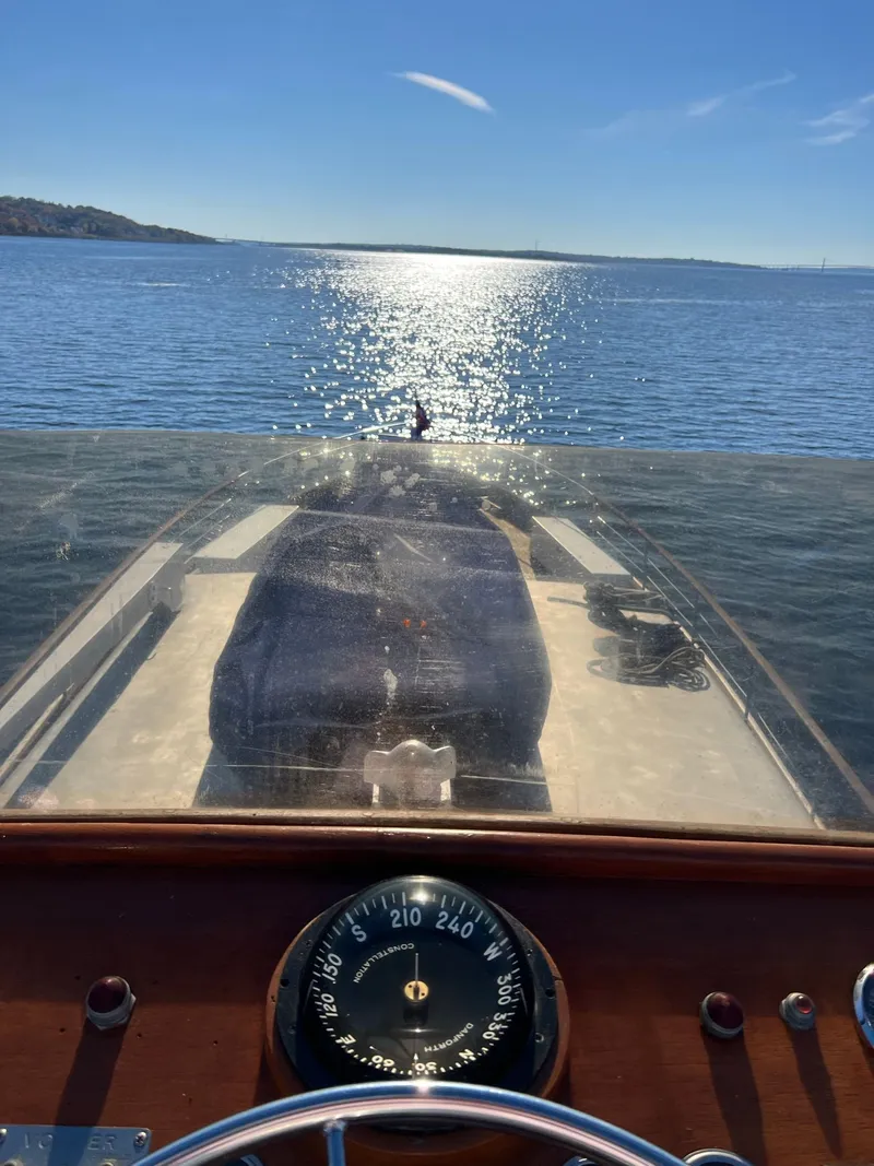Slide: The Image of View from 1971 Broward Motor Yacht cockpit over sunny sea. - 5