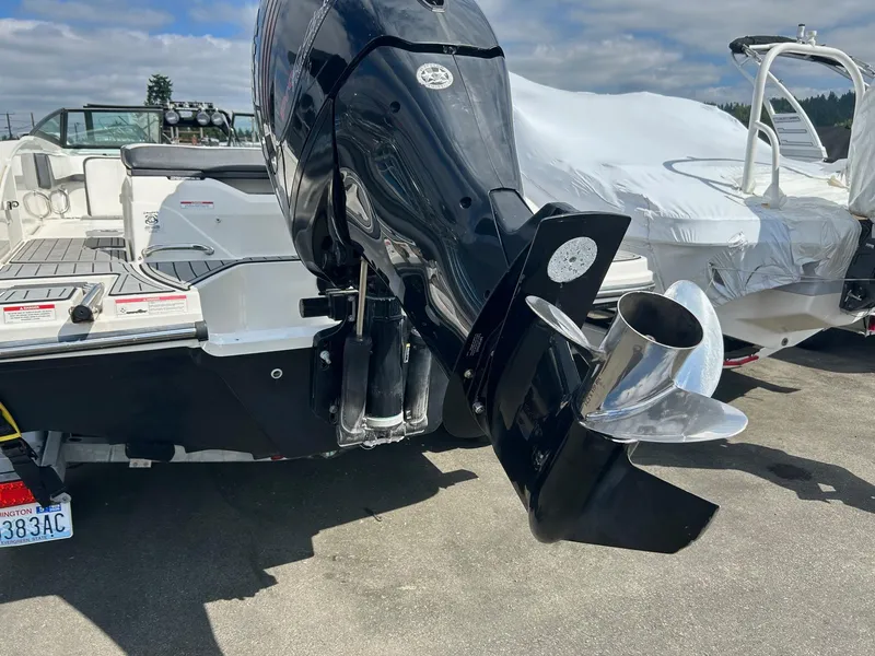 Slide: The Image of 2016 Sea Ray 21 SPX OB boat with outboard motor, docked on a sunny day. - 17