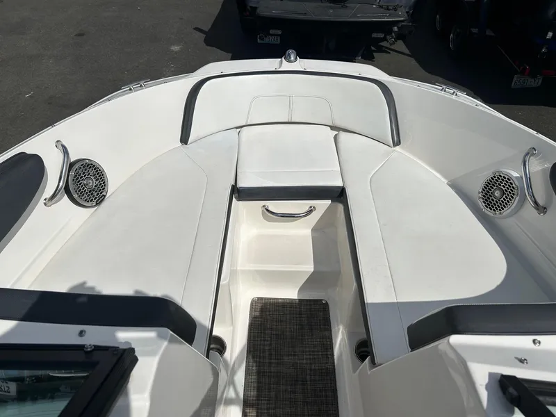 Slide: The Image of 2016 Sea Ray 21 SPX OB boat interior with seating and speakers. - 4