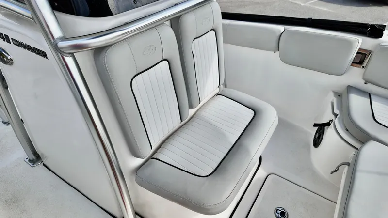 Slide: The Image of 2023 Sea Fox 248 Commander boat seating with white and gray upholstery. - 12