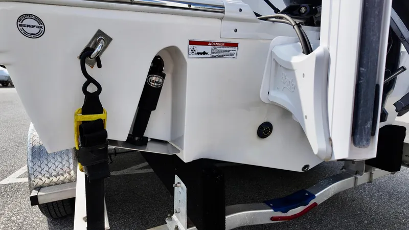 Slide: The Image of 2023 Sea Fox 248 Commander boat trailer detail with safety features and equipment. - 16