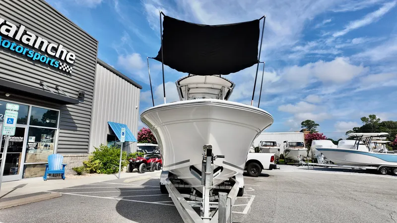 Slide: The Image of 2023 Sea Fox 248 Commander boat on trailer at Avalanche Motorsports dealership. - 4