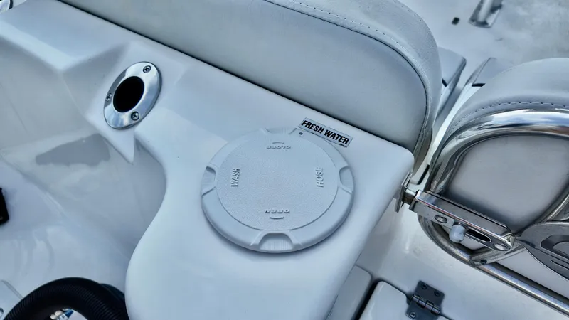 Slide: The Image of Freshwater access on 2023 Sea Fox 248 Commander boat, featuring wash and hose options. - 5
