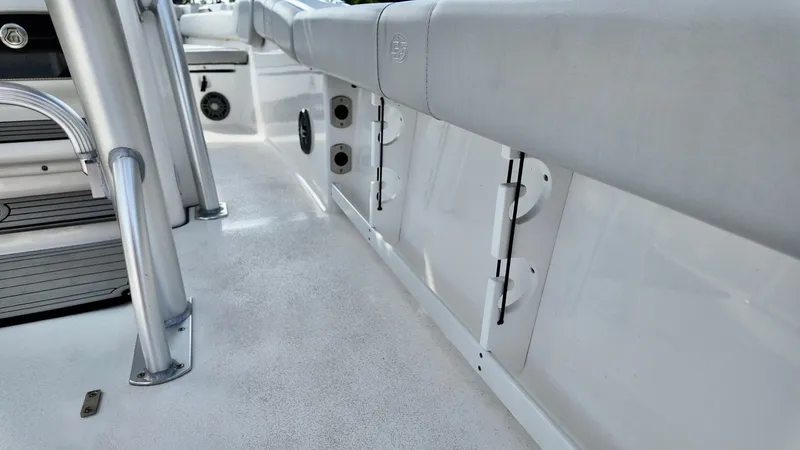 Slide: The Image of 2023 Sea Fox 248 Commander boat interior with seating and storage compartments. - 6