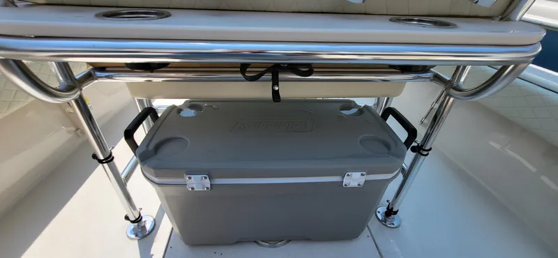 Slide: The Image of 2023 Sea Chaser 23 LX boat interior with cooler storage under seating. - 16