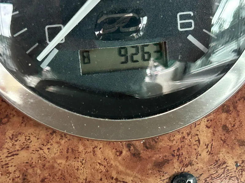 Slide: The Image of Close-up of a Sea Ray 290 Sundancer 2000 boat gauge displaying 9263 hours. - 6