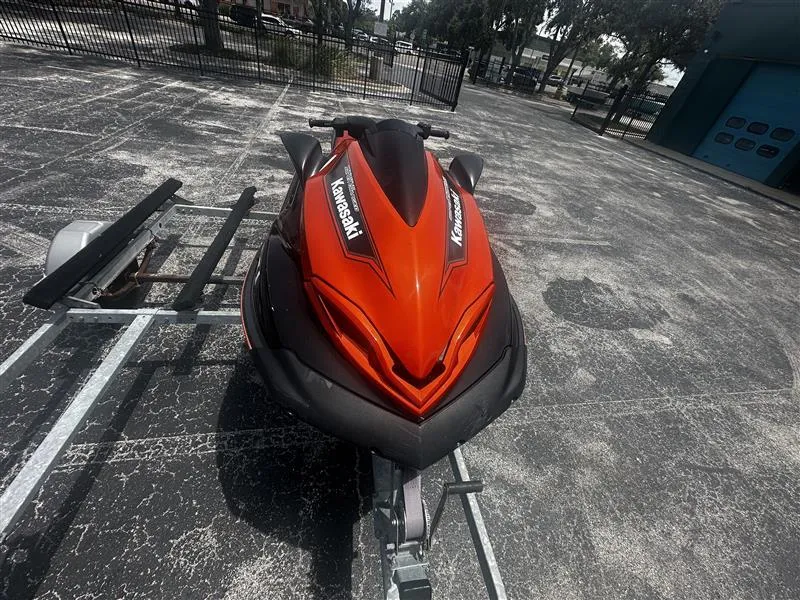 Slide: The Image of 2015 Kawasaki Jet Ski Ultra 310X SE in vibrant red on a trailer. - 5