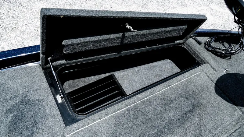 Slide: The Image of Open storage compartment on 2020 Skeeter ZX225 boat deck. - 14
