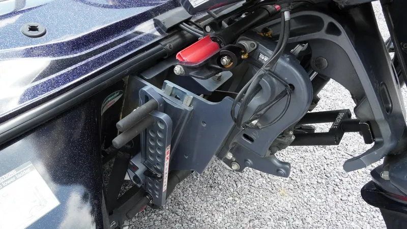 Slide: The Image of 2020 Skeeter ZX225 boat engine mount detail on gravel surface. - 20
