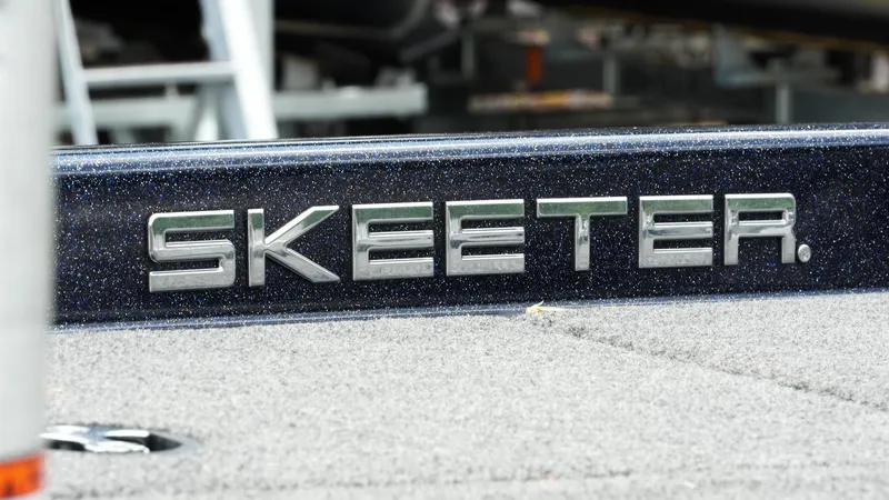 Slide: The Image of 2020 Skeeter ZX225 boat logo on textured surface. - 21