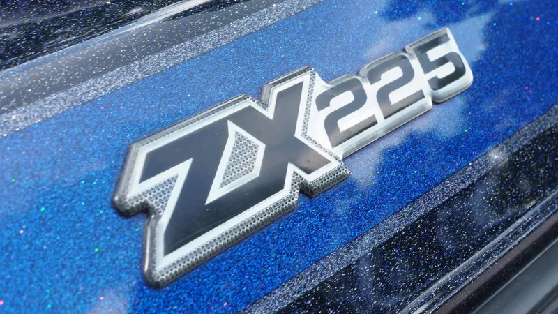 Slide: The Image of 2020 Skeeter ZX225 logo on a sparkling blue surface. - 23