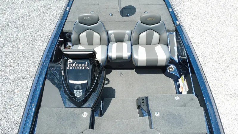 Slide: The Image of 2020 Skeeter ZX225 boat interior with dual seats and carpeted deck. - 6