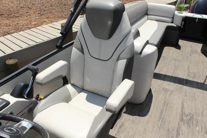 Slide: The Image of 2023 Tahoe CASCADE boat interior with luxurious seating and modern design. - 11