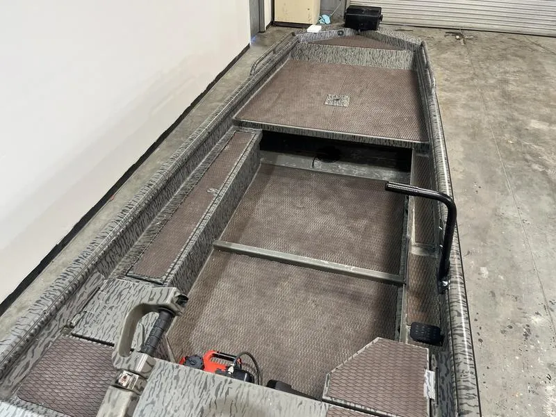 Slide: The Image of 2025 Gator Tail 1750 Savage Mid Deck boat interior, featuring a spacious, durable design. - 5