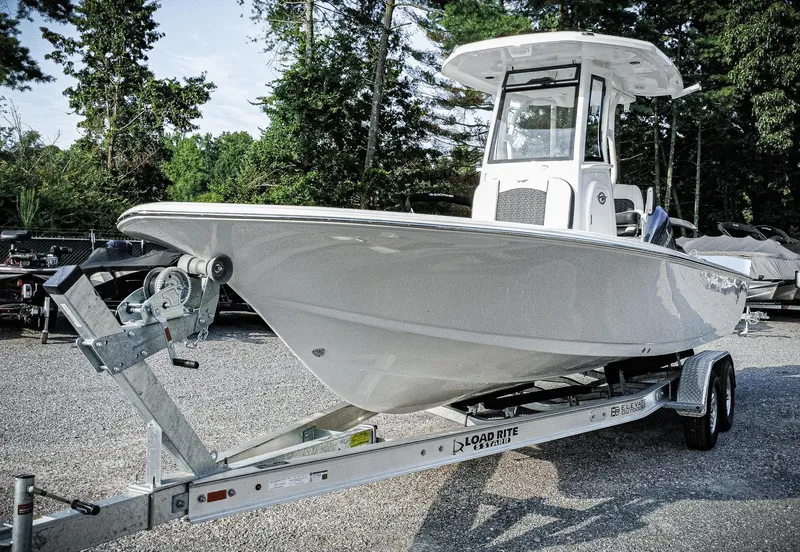 Slide: The Image of 2026 Tidewater 2410 Bay Max boat on trailer, parked outdoors. - 11