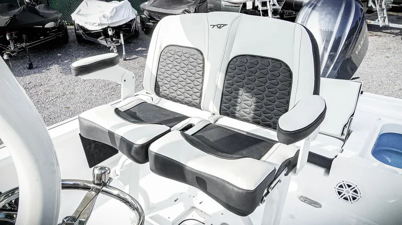 Slide: The Image of 2026 Tidewater 2410 Bay Max boat seats with black and white upholstery, featuring a stylish design. - 14