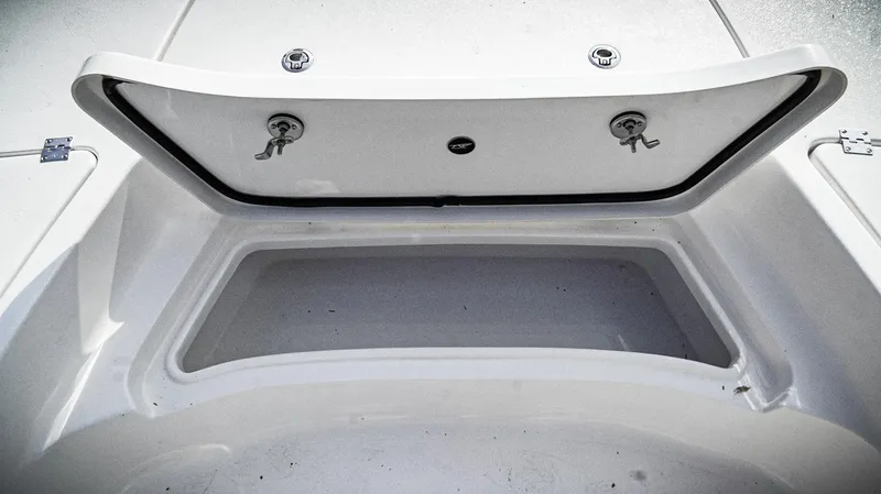 Slide: The Image of Open storage compartment on 2026 Tidewater 2410 Bay Max boat. - 17