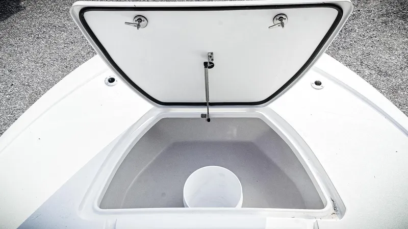 Slide: The Image of Open storage compartment on 2026 Tidewater 2410 Bay Max boat. - 18