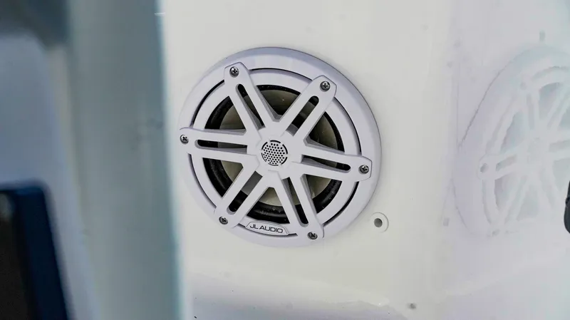 Slide: The Image of Speaker on 2026 Tidewater 2410 Bay Max boat, featuring JL Audio design. - 24