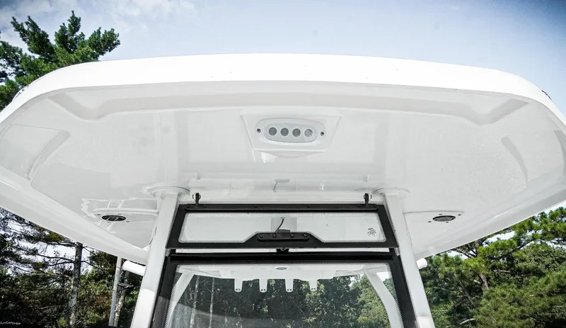Slide: The Image of 2026 Tidewater 2410 Bay Max boat canopy with integrated lighting, viewed from below. - 25