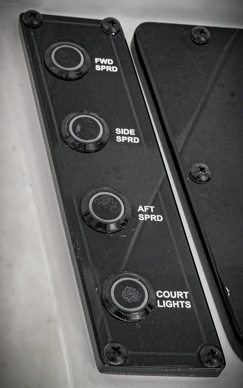 Slide: The Image of Control panel of 2026 Tidewater 2410 Bay Max boat with labeled buttons. - 36