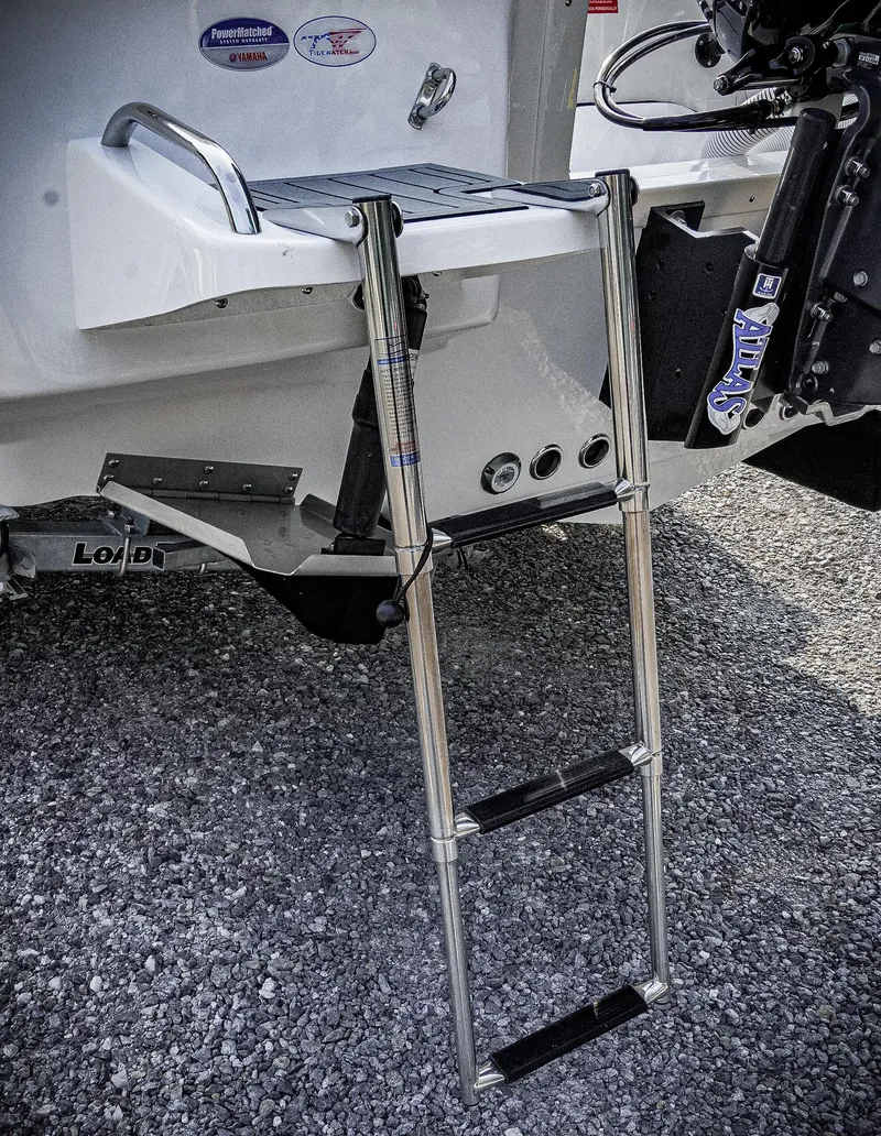 Slide: The Image of Stainless steel ladder on 2026 Tidewater 2410 Bay Max boat, rear view. - 39