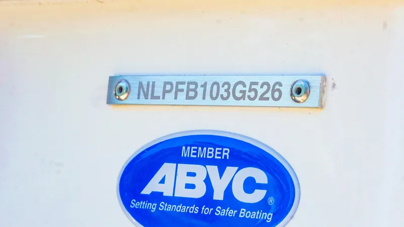 Slide: The Image of 2026 Tidewater 2410 Bay Max boat with ABYC member plaque and serial number. - 42