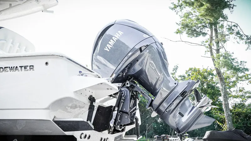 Slide: The Image of 2026 Tidewater 2410 Bay Max boat with Yamaha outboard motor, side view. - 44