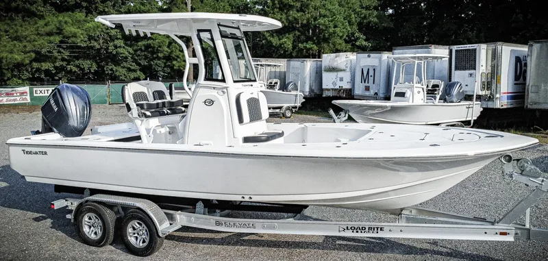 Slide: The Image of 2026 Tidewater 2410 Bay Max boat on trailer, parked outdoors. - 6