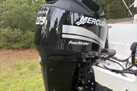 Slide: The Image of 1977 Aquasport 222 boat with Mercury 225 FourStroke outboard motor. - 12