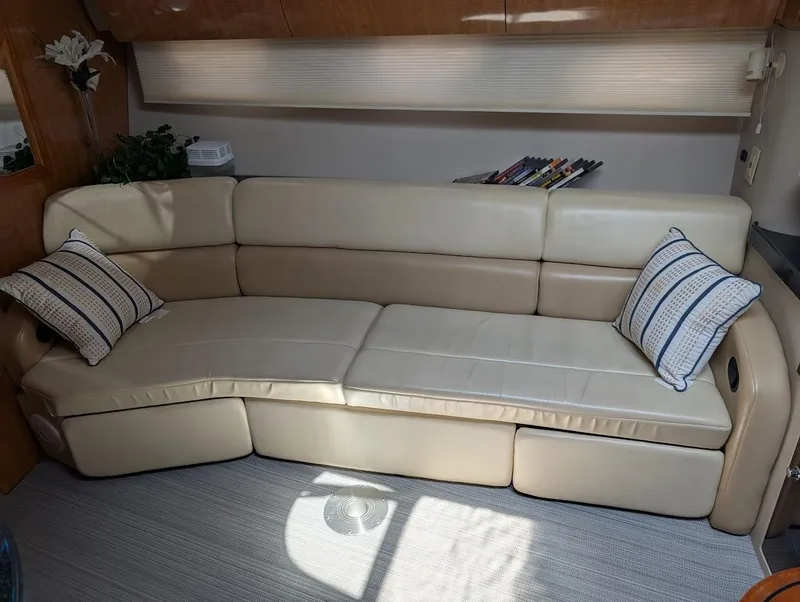 Slide: The Image of Luxurious beige leather sofa in 2002 Regal Commodore 3860 yacht interior. - 22