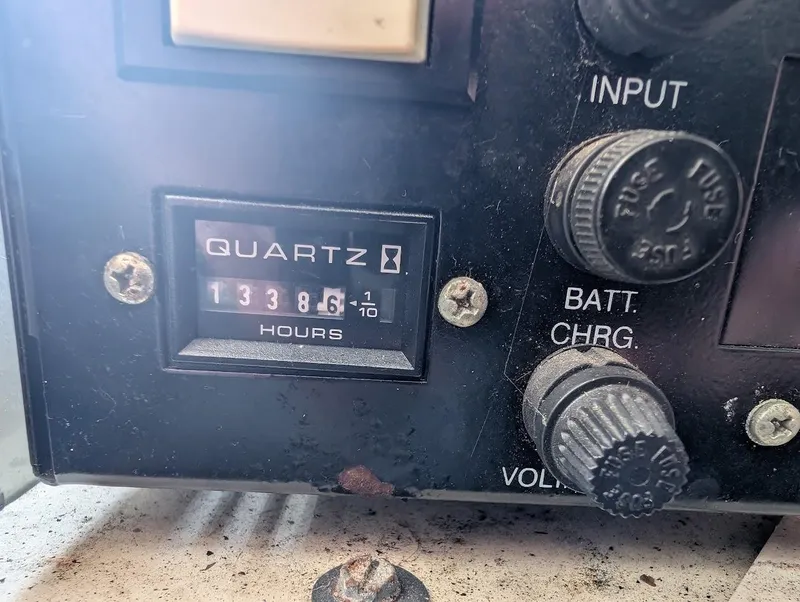 Slide: The Image of Close-up of a Regal Commodore 3860 control panel, showing 1338.6 hours. - 44