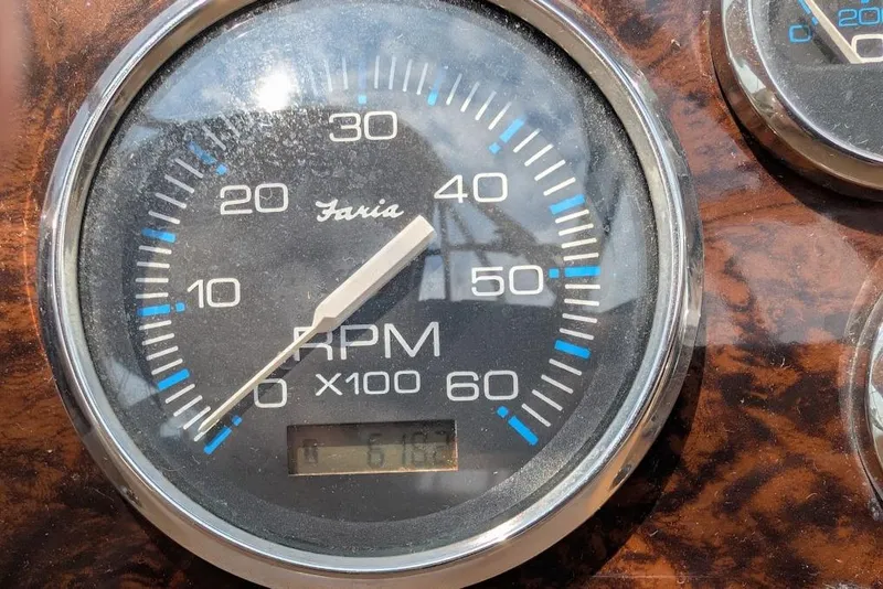 Slide: The Image of Close-up of a Faria RPM gauge on a 2002 Regal Commodore 3860 boat. - 46
