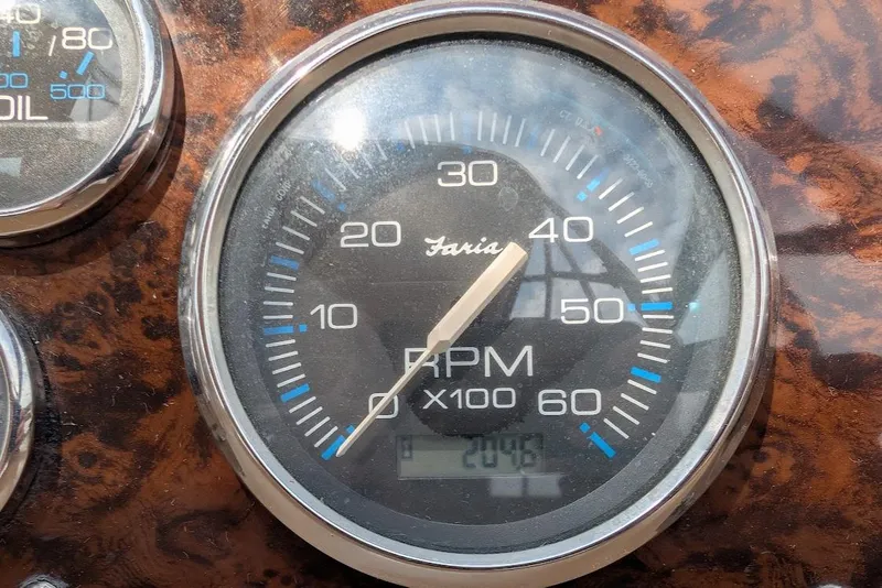 Slide: The Image of Tachometer of 2002 Regal Commodore 3860 boat, showing RPM gauge. - 47