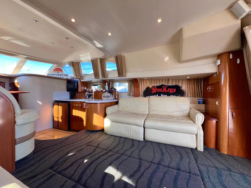 Slide: The Image of Luxurious interior of 2004 Carver 420 Mariner yacht with plush seating and modern amenities. - 15