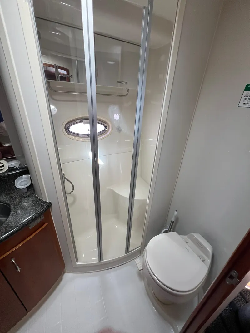 Slide: The Image of Bathroom in 2004 Carver 420 Mariner yacht with shower and toilet. - 34