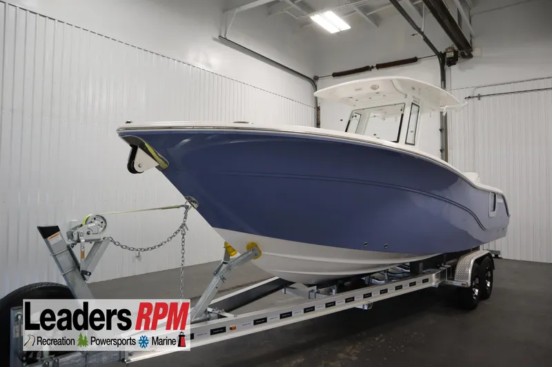 The Image of 2026 Sea Fox 268 Commander boat on trailer in showroom. - 0