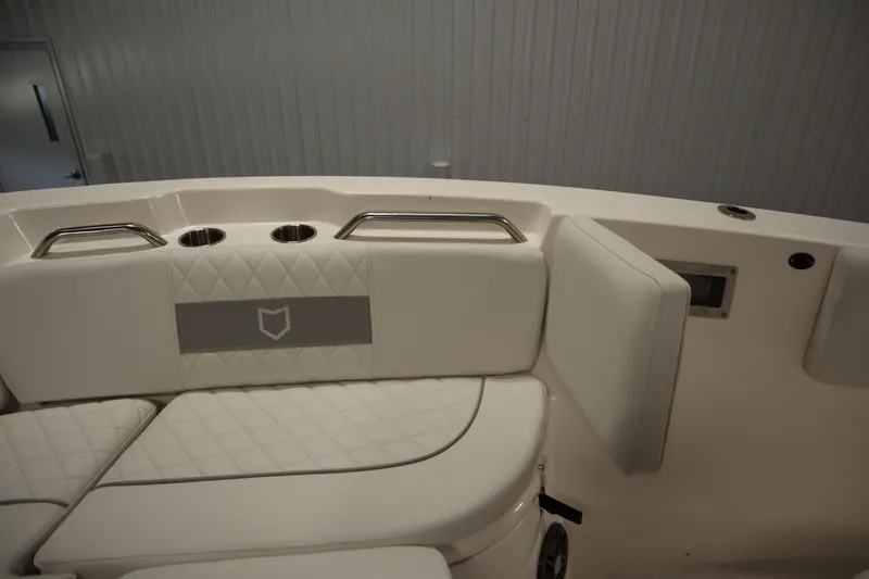 Slide: The Image of Interior of 2026 Sea Fox 268 Commander boat with white cushioned seating. - 19