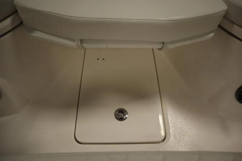 Slide: The Image of 2026 Sea Fox 268 Commander boat interior storage compartment with cushioned seating. - 20