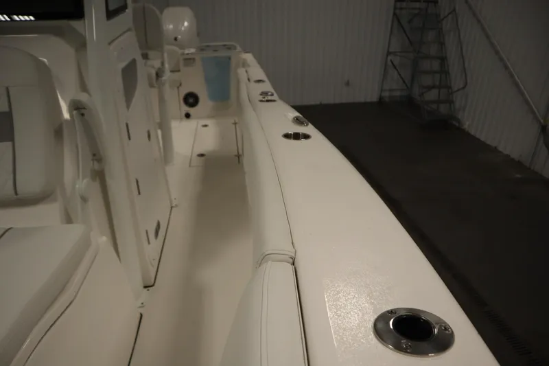 Slide: The Image of 2026 Sea Fox 268 Commander boat interior with seating and rod holders. - 24