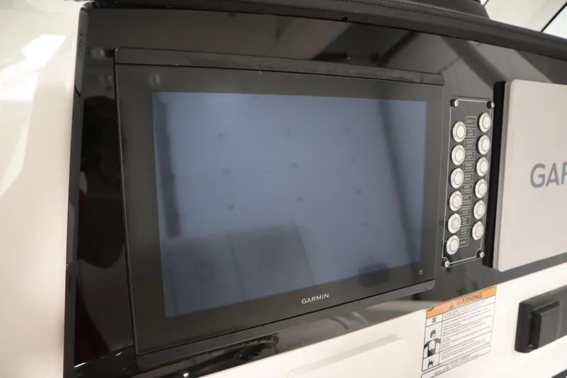 Slide: The Image of Garmin display on 2026 Sea Fox 268 Commander boat dashboard with control panel. - 40