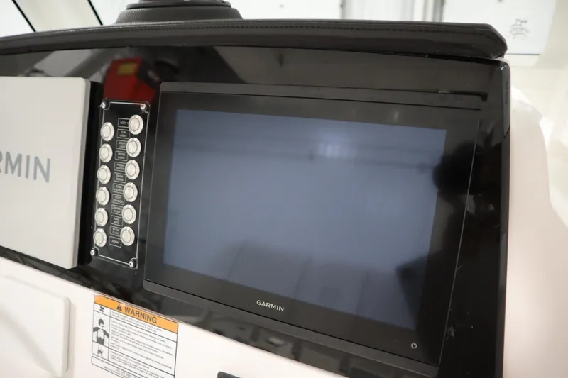 Slide: The Image of 2026 Sea Fox 268 Commander dashboard with Garmin display and control panel. - 42