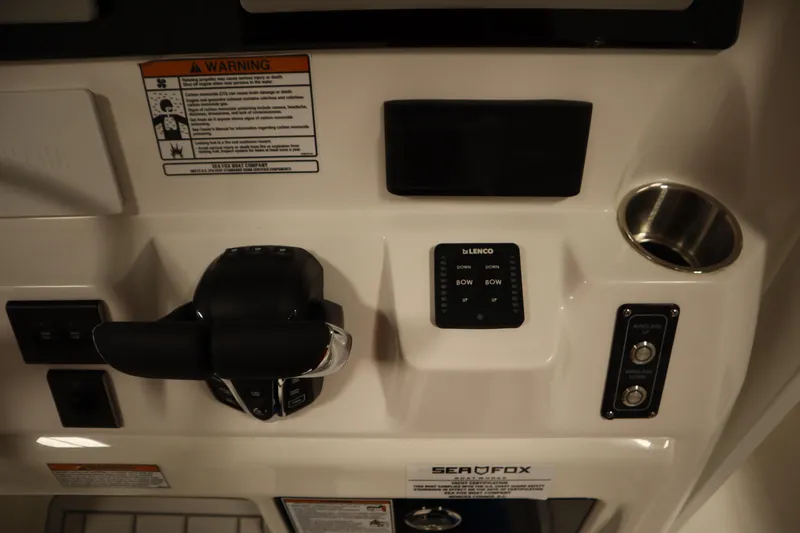 Slide: The Image of Control panel of 2026 Sea Fox 268 Commander boat with throttle and switches. - 47